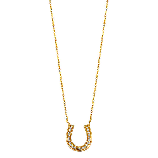 Gold necklace with a horseshoe-shaped pendant on a white background