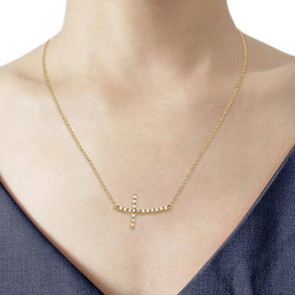 Gold necklace with a small pendant on a mannequin available on the TX.ORO website.