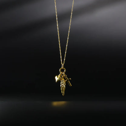 Gold necklace with a pendant on a black background available on the TX.ORO website.