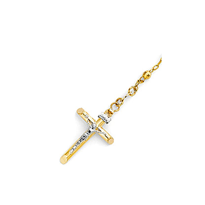 Gold cross pendant on a chain against a white background availabe on TX.ORO website.