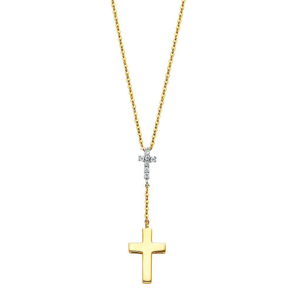Gold cross necklace with a smaller diamond pendant on a white background available on the TX.ORO website.