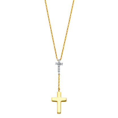 Gold cross necklace with a smaller diamond pendant on a white background available on the TX.ORO website.