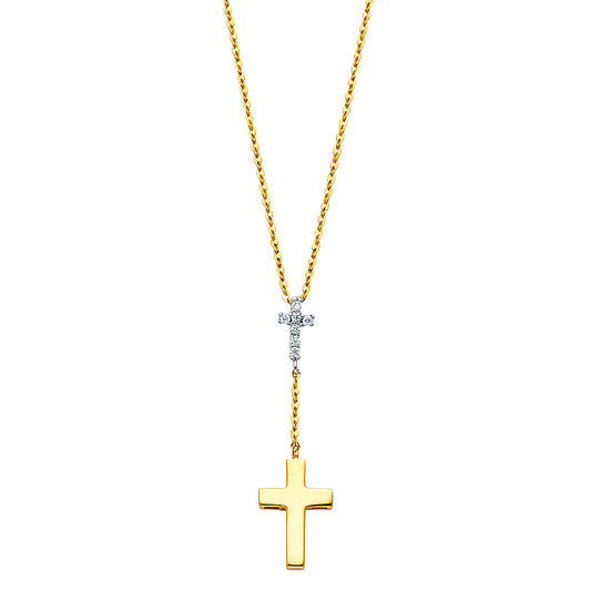 Gold cross necklace with a smaller diamond pendant on a white background available on the TX.ORO website.
