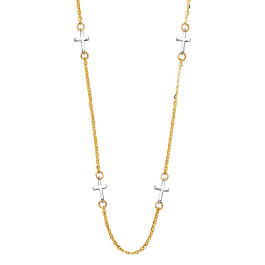 Necklace with gold and silver cross pendants on a white background available on the TX.ORO website.