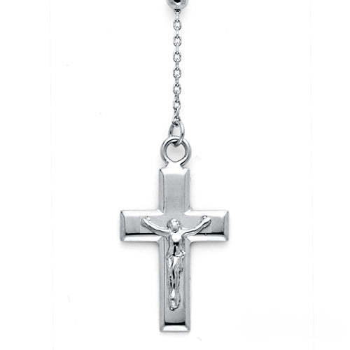 Silver cross pendant with Jesus figure on a white background available on the TX.ORO website.