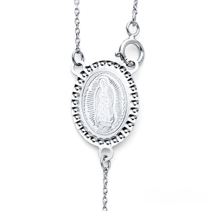 Silver necklace with a pendant featuring an engraved design on a white background available on the TX.ORO website.