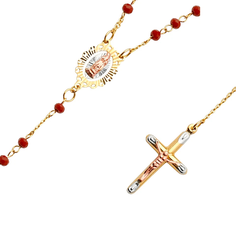 Gold rosary with red beads and a cross on a white background available on the TX.ORO website.