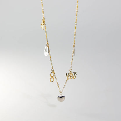 Gold necklace with various charms on a light gray background available on the TX.ORO website.