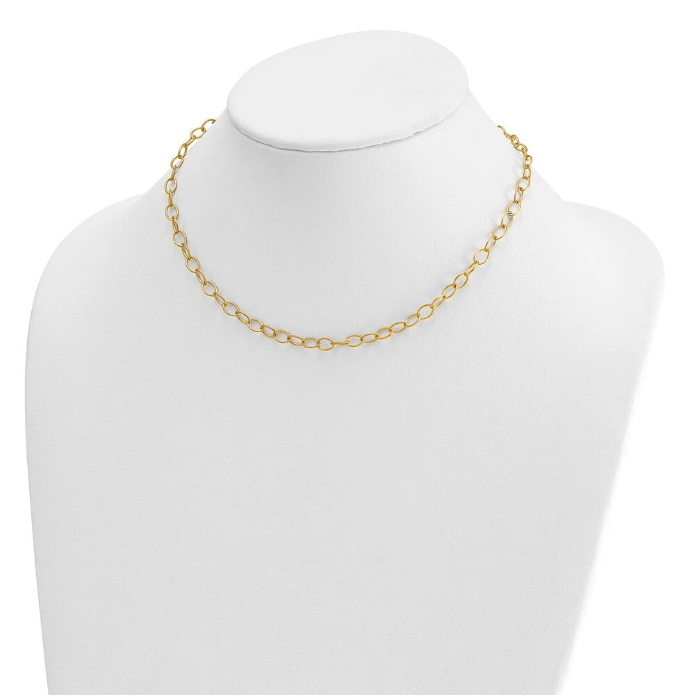 Gold chain necklace on a mannequin bust against a white background available on the TX.ORO website.