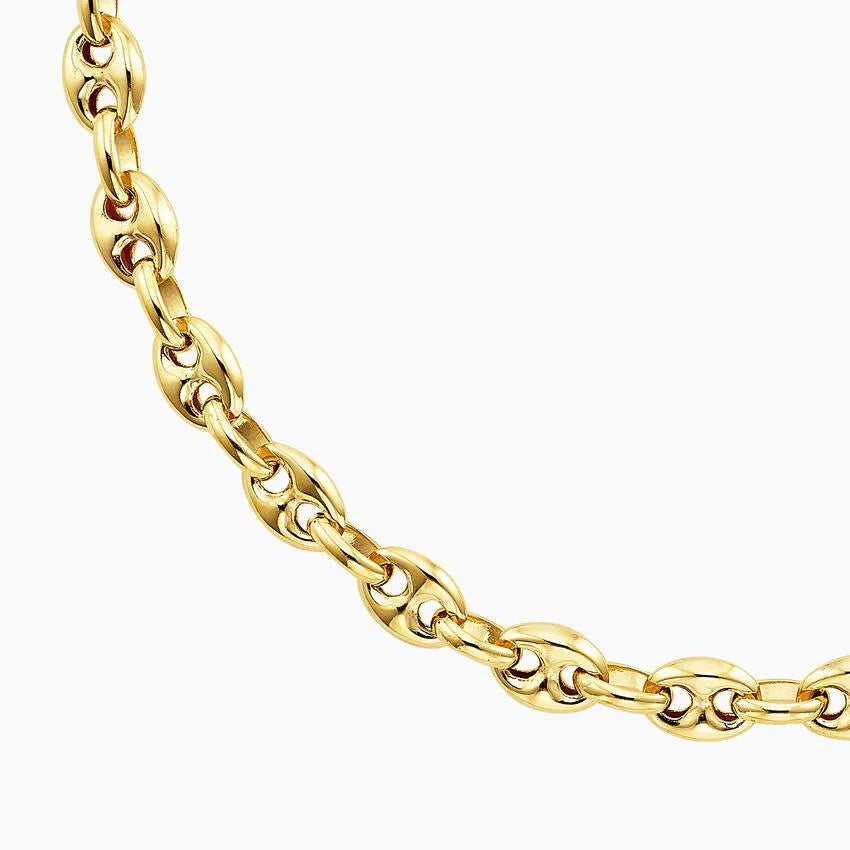 Gold chain on a white background available on the TX.ORO website.