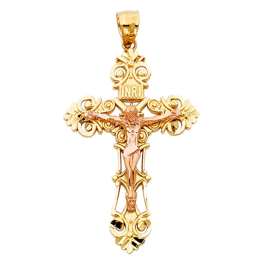 Gold and rose gold crucifix pendant on a white background