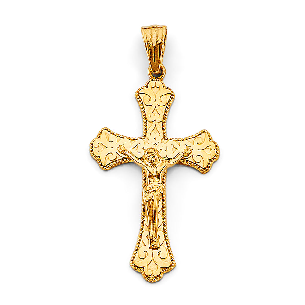 Gold crucifix pendant on a white background