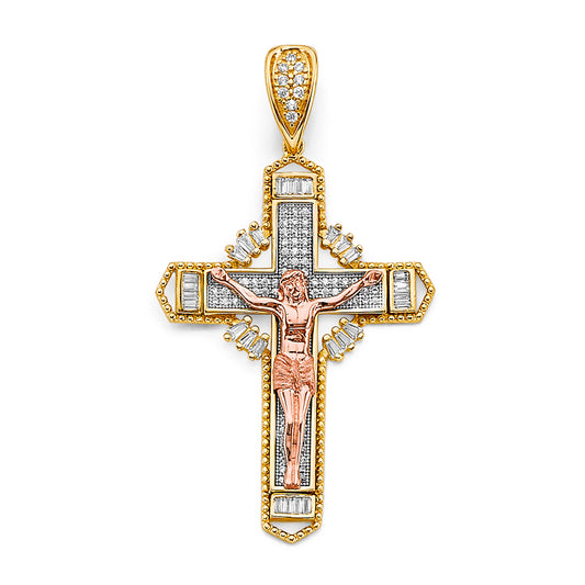 Gold and rose gold cross pendant with crucifix on a white background