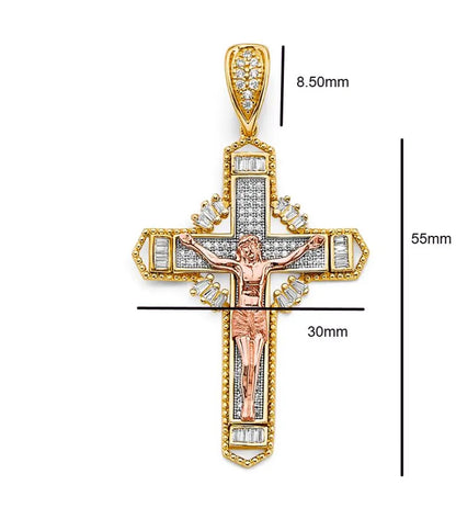 Gold and rose gold cross pendant with measurements on a white background