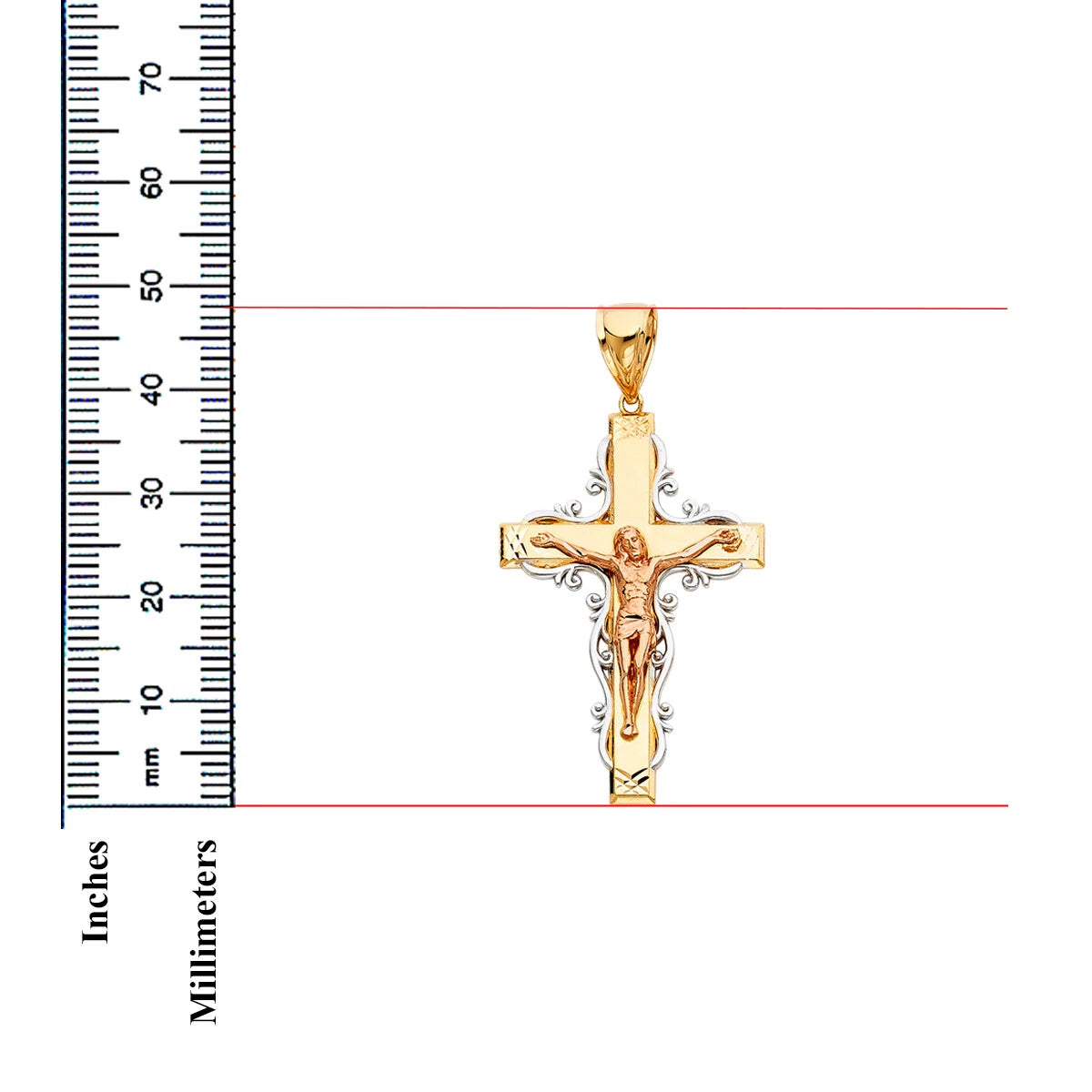 Gold crucifix pendant with ruler for scale on a white background