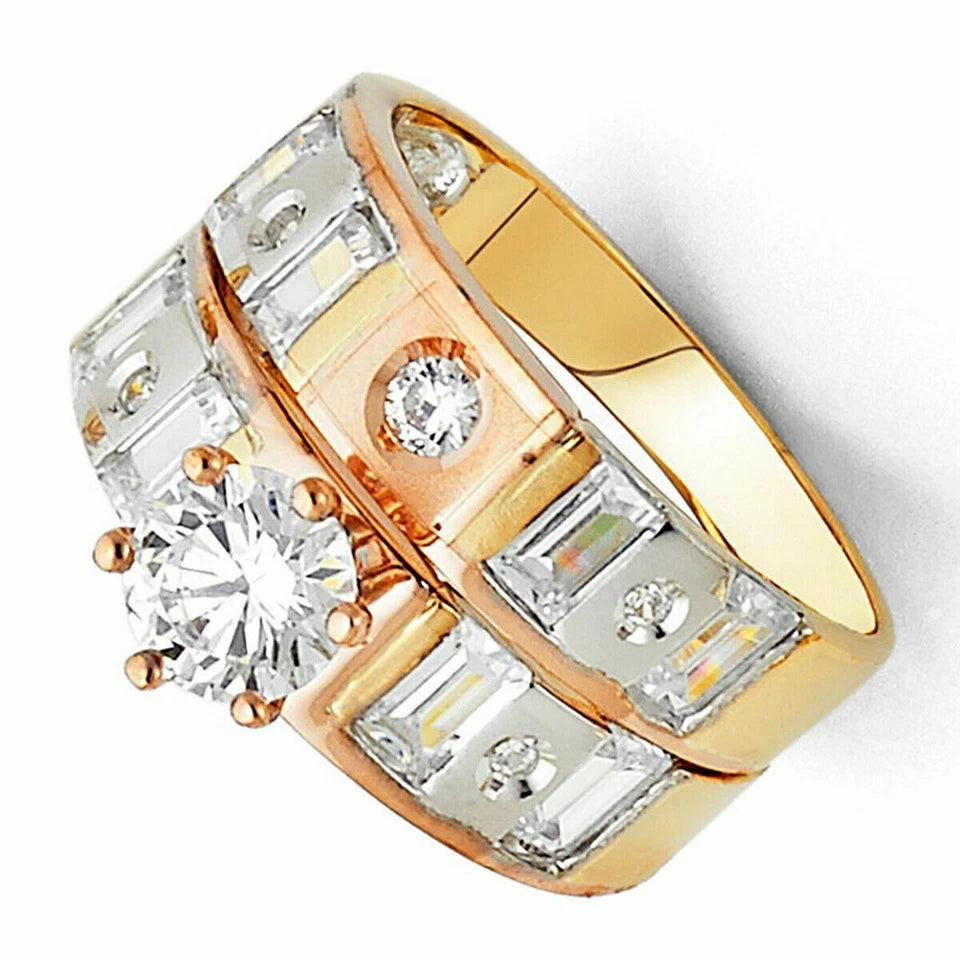 Gold and rose gold ring with diamonds on a white background availabe on TX.ORO website.