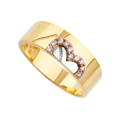 Gold ring with heart design and diamonds on a white background availabe on TX.ORO website.