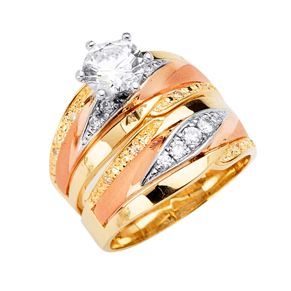 Gold and rose gold ring with diamonds on a white background