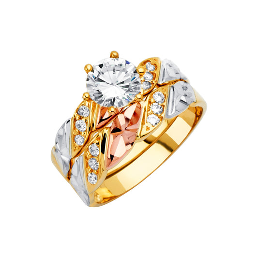 Gold, rose gold, and silver ring with a large central gemstone on a white background availabe on TX.ORO website.