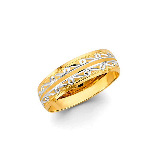 Gold ring with intricate design on a white background