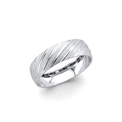 Silver ring with textured design on a white background