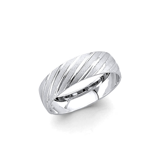 Silver ring with textured design on a white background