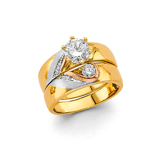 Gold and silver ring with diamonds on a white background availabe on TX.ORO website.