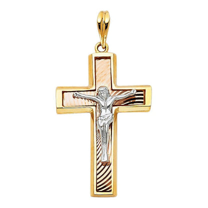 Gold and silver cross pendant with Jesus figure on a white background