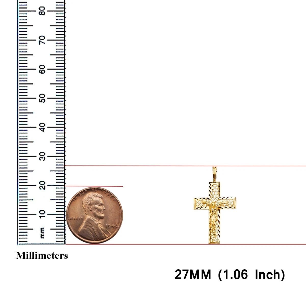 Gold cross pendant with a penny and ruler for size reference on a white background